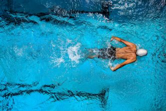 Man exercising in the pool
