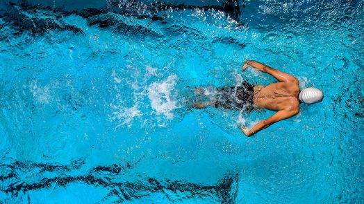 Man exercising in the pool