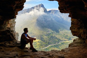 Man on mountain - choose peace