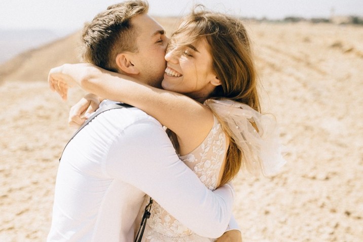 Loving couple hugging on beach