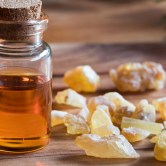 Frankincense resin and oil on a table