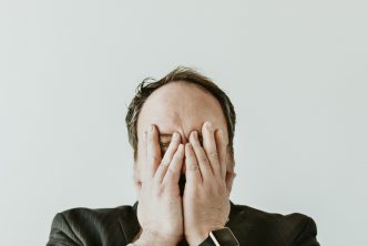 Man experiencing emotional overload