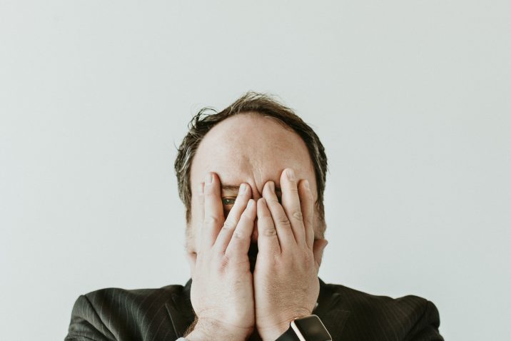 Man experiencing emotional overload