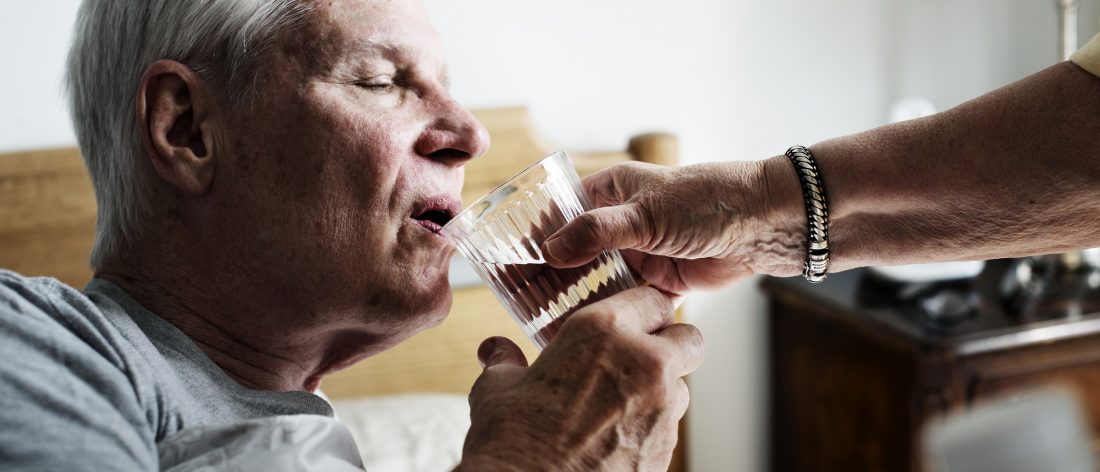 Elderly man taking Rember