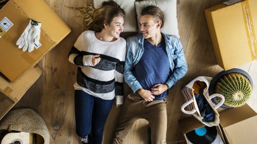 Couple in bed, talking