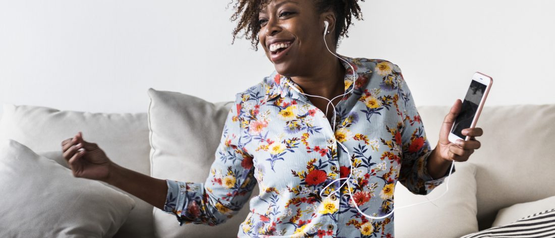 Woman loving life while listening to music