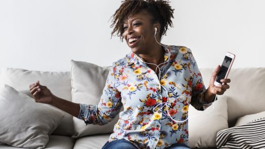Woman loving life while listening to music