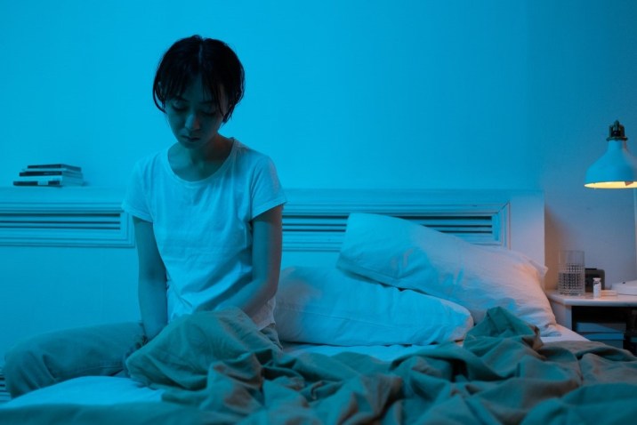 Woman in bed with insomnia