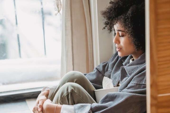 Woman sitting and using guided imagery for healing